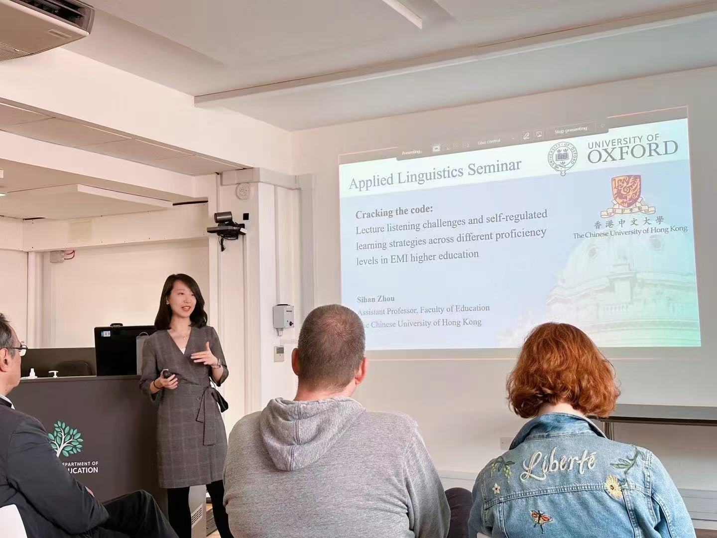Sihan Zhou giving a talk at the University of Oxford